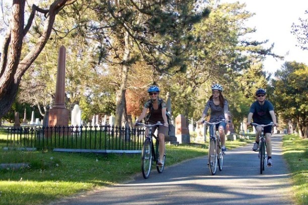 a group of people riding bikes in Victoria, B.C.