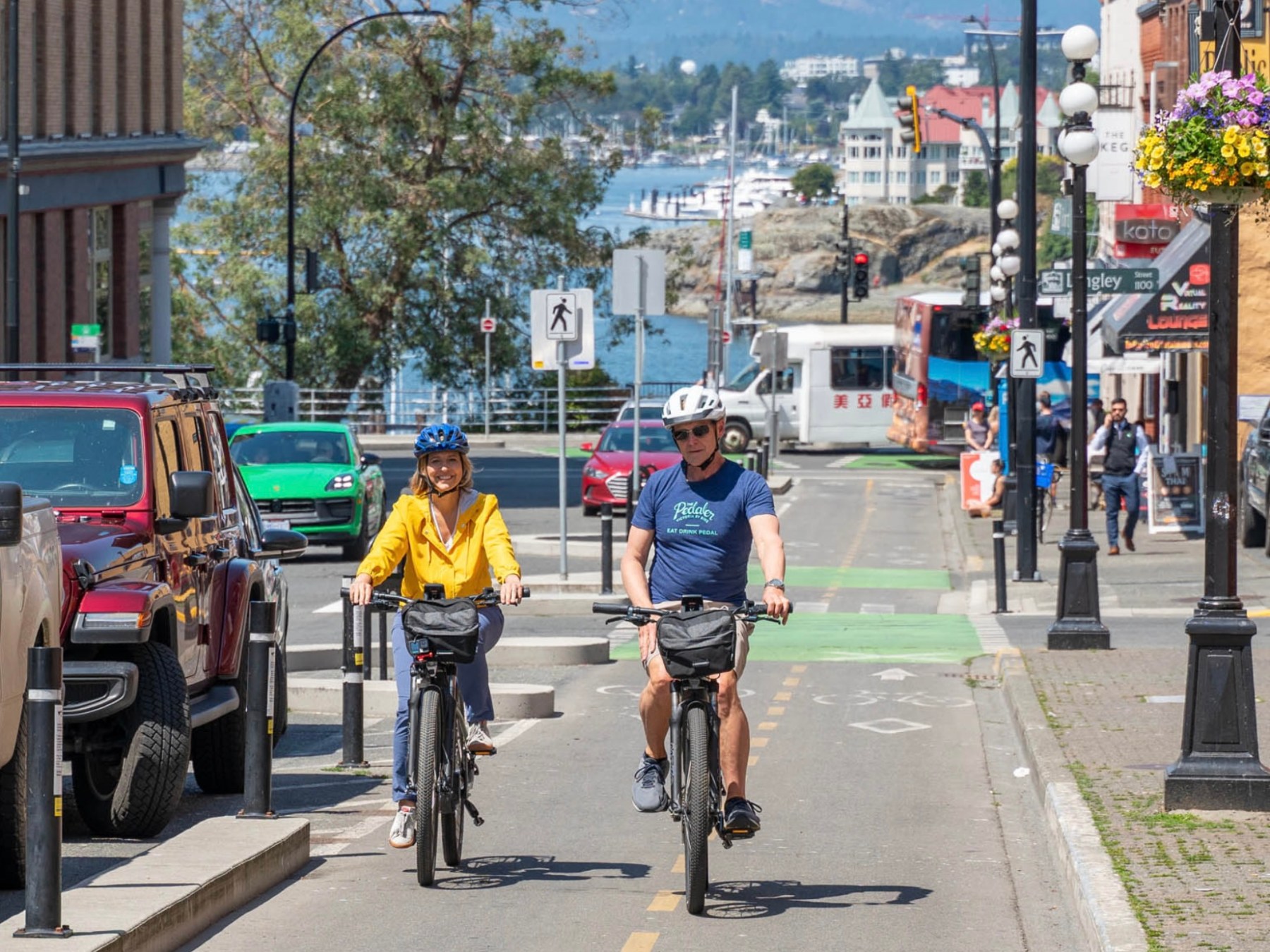 a person riding a bicycle on a city street