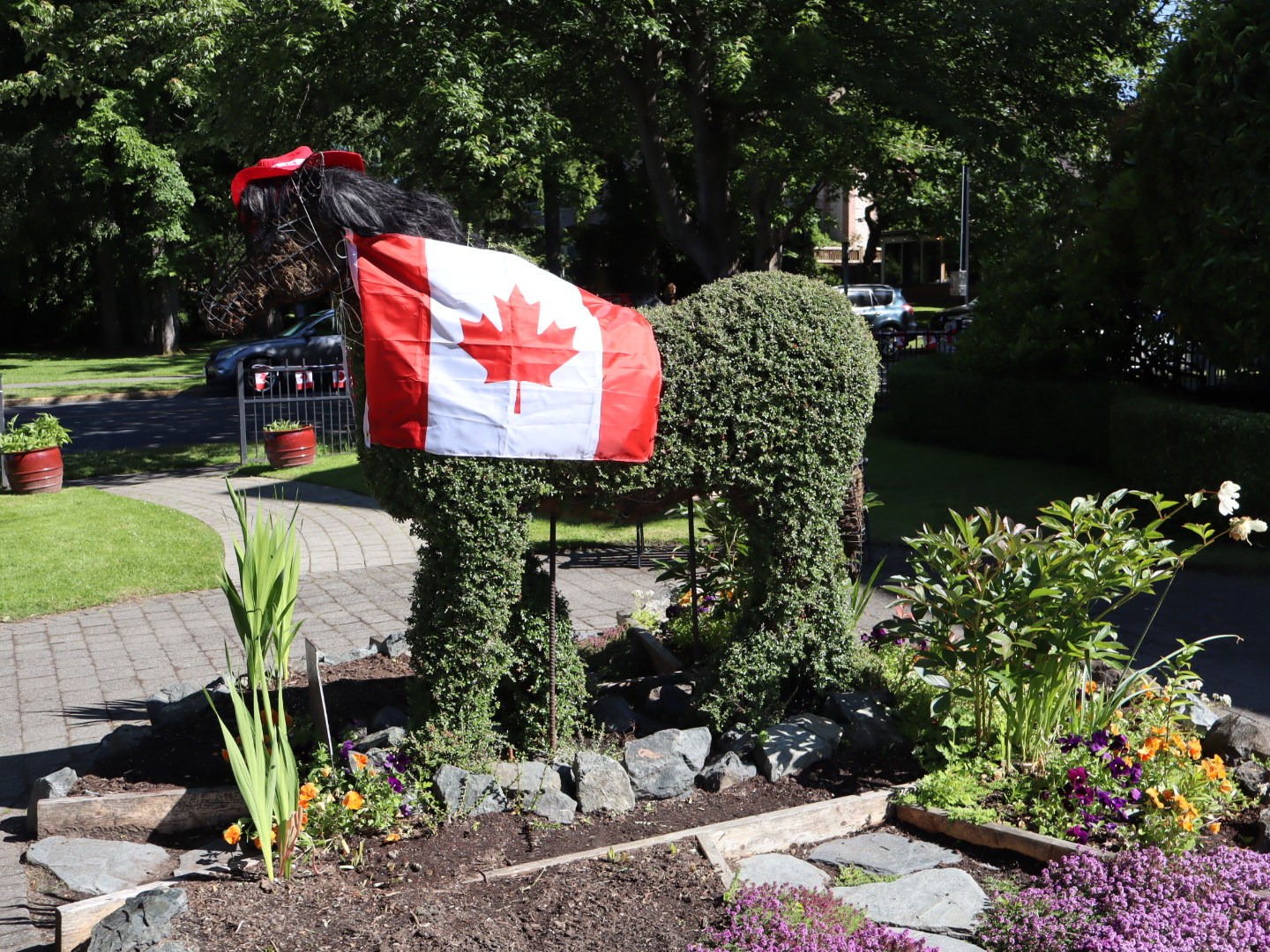 a statue of a person in a garden